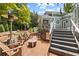 Brick patio with fire pit and comfortable seating at 117 N Cove Dr, Peachtree City, GA 30269