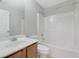 Simple bathroom with shower/tub combo and wood vanity at 1762 Caswell Pkwy # 33, Marietta, GA 30060