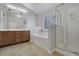Bathroom boasts a garden tub, shower, and double vanity at 1762 Caswell Pkwy # 33, Marietta, GA 30060