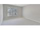 Well-lit bedroom with neutral walls and carpet flooring at 1762 Caswell Pkwy # 33, Marietta, GA 30060
