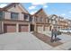 Townhomes with attached garages and neatly landscaped yards at 1762 Caswell Pkwy # 33, Marietta, GA 30060