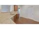 Modern kitchen features granite countertops, stainless steel appliances, and wood cabinets at 1762 Caswell Pkwy # 33, Marietta, GA 30060