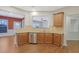 Kitchen with granite countertops, stainless steel appliances, and hardwood floors at 1762 Caswell Pkwy # 33, Marietta, GA 30060