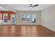 Bright living room with hardwood floors, fireplace, and access to rear patio at 1762 Caswell Pkwy # 33, Marietta, GA 30060