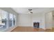 Spacious living room featuring hardwood floors and a cozy fireplace at 1762 Caswell Pkwy # 33, Marietta, GA 30060