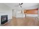 Open concept living room with hardwood floors, fireplace and kitchen views at 1762 Caswell Pkwy # 33, Marietta, GA 30060