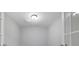 Small storage room with French doors and neutral paint at 1762 Caswell Pkwy # 33, Marietta, GA 30060