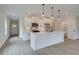 Modern white kitchen with island and stainless steel appliances at 221 Admor Ln, Acworth, GA 30102