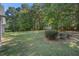 Spacious backyard with shed and wooded area at 5623 Yeager Ridge Dr, Douglasville, GA 30135