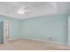 Spacious main bedroom with light walls, ceiling fan, and ample closet space at 5623 Yeager Ridge Dr, Douglasville, GA 30135