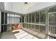 Relaxing screened porch with swing and wooded views at 5623 Yeager Ridge Dr, Douglasville, GA 30135