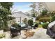 Spacious patio with seating area and grill at 3027 Saint Annes Nw Ln, Atlanta, GA 30327