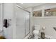 Bathroom with shower, toilet and patterned tile floor at 3027 Saint Annes Nw Ln, Atlanta, GA 30327