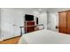 Main bedroom with ample closet space and hardwood floors at 3027 Saint Annes Nw Ln, Atlanta, GA 30327