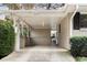 Covered carport with brick exterior at 3027 Saint Annes Nw Ln, Atlanta, GA 30327