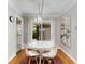 Bright dining area with round table, chairs, and access to backyard at 3027 Saint Annes Nw Ln, Atlanta, GA 30327