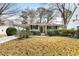 Charming ranch home with front yard at 3027 Saint Annes Nw Ln, Atlanta, GA 30327