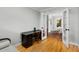Home office features hardwood floors and French doors opening to dining area at 3027 Saint Annes Nw Ln, Atlanta, GA 30327