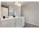 Double vanity bathroom with white cabinets and a large mirror at 2844 Saratoga Lake Vw, Decatur, GA 30034