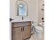 Modern bathroom with brown vanity, toilet and bathtub at 2144 Suncrest Pt, Marietta, GA 30064