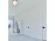 Spacious bedroom with neutral carpeting and a private bathroom at 2144 Suncrest Pt, Marietta, GA 30064
