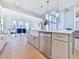 Modern kitchen island with farmhouse sink and gold fixtures at 2144 Suncrest Pt, Marietta, GA 30064