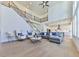 Spacious living room with hardwood floors, high ceilings and a cozy seating area at 2144 Suncrest Pt, Marietta, GA 30064