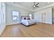 Spacious main bedroom with hardwood floors, large windows and ensuite bathroom at 2144 Suncrest Pt, Marietta, GA 30064