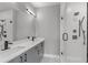 Modern bathroom with double vanity, quartz countertop, and large shower at 1160 Ormewood Ave # 11, Atlanta, GA 30316