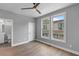 Bedroom with hardwood floors, large windows, and access to bathroom at 1160 Ormewood Ave # 11, Atlanta, GA 30316