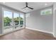 Bright bedroom with hardwood floors, large windows, and ceiling fan at 1160 Ormewood Ave # 11, Atlanta, GA 30316