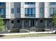 Townhome exterior with gray siding and white trim at 1160 Ormewood Ave # 11, Atlanta, GA 30316