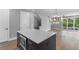 Modern kitchen island with built-in microwave at 1160 Ormewood Ave # 11, Atlanta, GA 30316