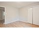 Bright bedroom with hardwood floors and double-door closet at 3550 Manhattan Dr, Decatur, GA 30034