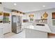 Modern kitchen with stainless steel appliances and white shaker cabinets at 3741 Hickory Se Cir, Smyrna, GA 30080