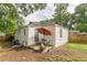 Relaxing backyard patio with seating, fire pit, and partial privacy fence at 723 Campbell Cir, Hapeville, GA 30354