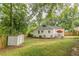 Spacious backyard with storage shed and wooden fence at 723 Campbell Cir, Hapeville, GA 30354