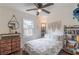 Cozy bedroom with a queen-size bed and built-in shelving at 723 Campbell Cir, Hapeville, GA 30354