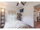 Comfortable bedroom with queen bed, ceiling fan, and bookcase at 723 Campbell Cir, Hapeville, GA 30354