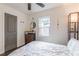 Bedroom with a dresser and view of backyard at 723 Campbell Cir, Hapeville, GA 30354