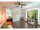 Bedroom with a room divider and ceiling fan at 723 Campbell Cir, Hapeville, GA 30354