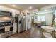 Open concept kitchen with stainless steel appliances and view of living room at 723 Campbell Cir, Hapeville, GA 30354