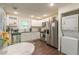 Modern kitchen with stainless steel appliances and white cabinets at 723 Campbell Cir, Hapeville, GA 30354