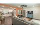 Open living space showcasing kitchen and living area with hardwood floors at 723 Campbell Cir, Hapeville, GA 30354