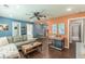 Bright living room with sectional sofa, coffee table, and hardwood floors at 723 Campbell Cir, Hapeville, GA 30354