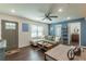 Open living area with sectional sofa, coffee table, and hardwood floors at 723 Campbell Cir, Hapeville, GA 30354
