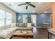 Spacious living room featuring a sectional sofa and hardwood floors at 723 Campbell Cir, Hapeville, GA 30354
