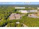 Aerial view of townhouses with surrounding landscape at 3927 Snipes Ct, Lilburn, GA 30047