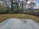 Fenced backyard with grassy area and patio at 2314 Emerald Springs Dr, Decatur, GA 30035