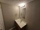 Clean bathroom with vanity, mirror and updated fixtures at 2314 Emerald Springs Dr, Decatur, GA 30035